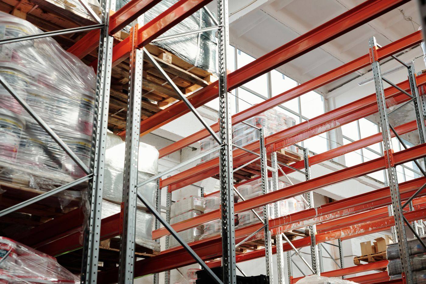 Warehouse storage racks stocked with palletized inventory